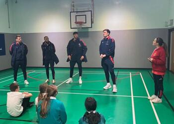 MUFC Players Visit Pioneer House