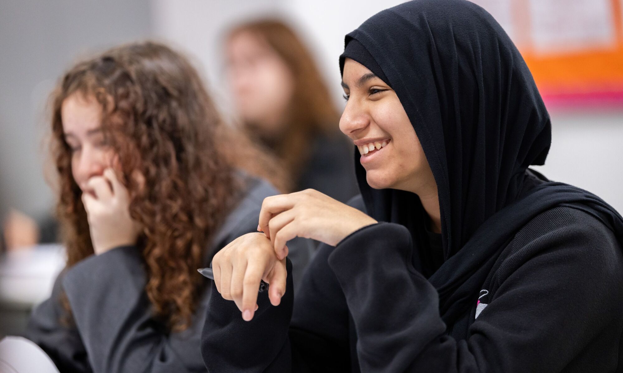 Prospere Learning Trust students in a classroom, smiling