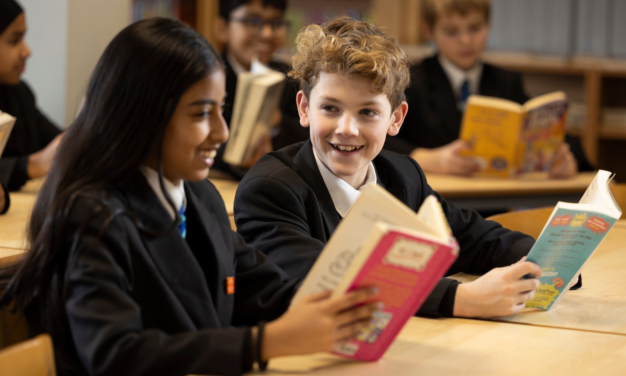 Prospere Learning Trust students reading a book chorlton high school image 10